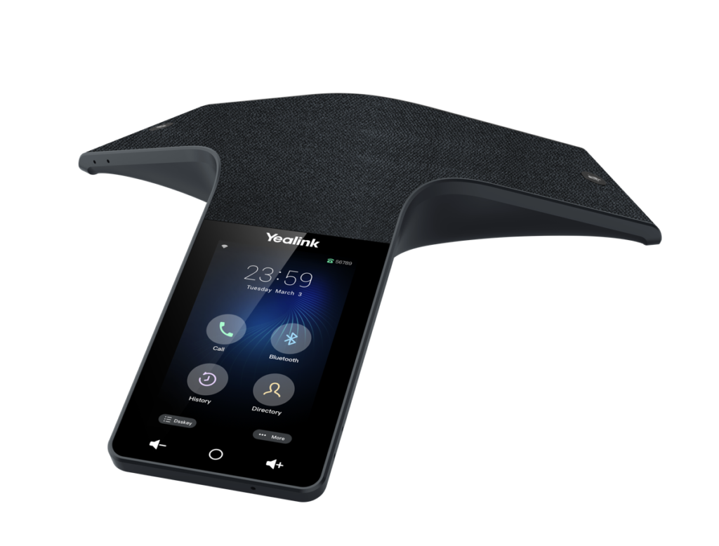 A modern conference speakerphone with a touchscreen display showing time, date, and call options. The device is black, triangular, and branded Yealink on the screen.