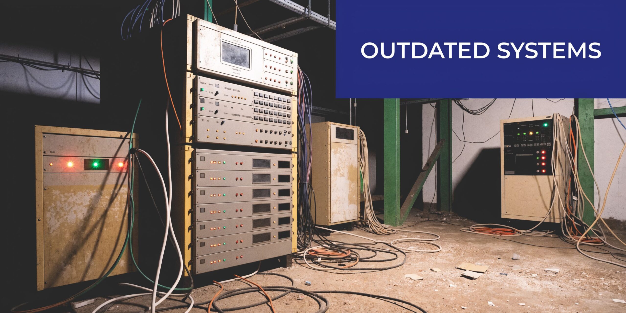 An old, dusty room with outdated computer server racks and tangled cables, symbolizing obsolete technology infrastructure.