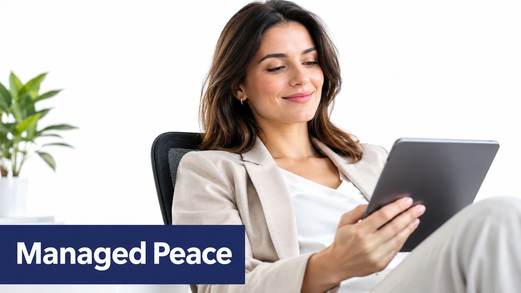 A professional woman in a blazer smiling while reviewing documents on a digital tablet in an office.